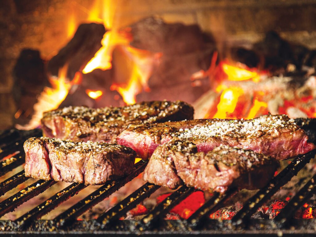 Área de lazer com churrasco. Foto Pexels / Pascal Claivaz
